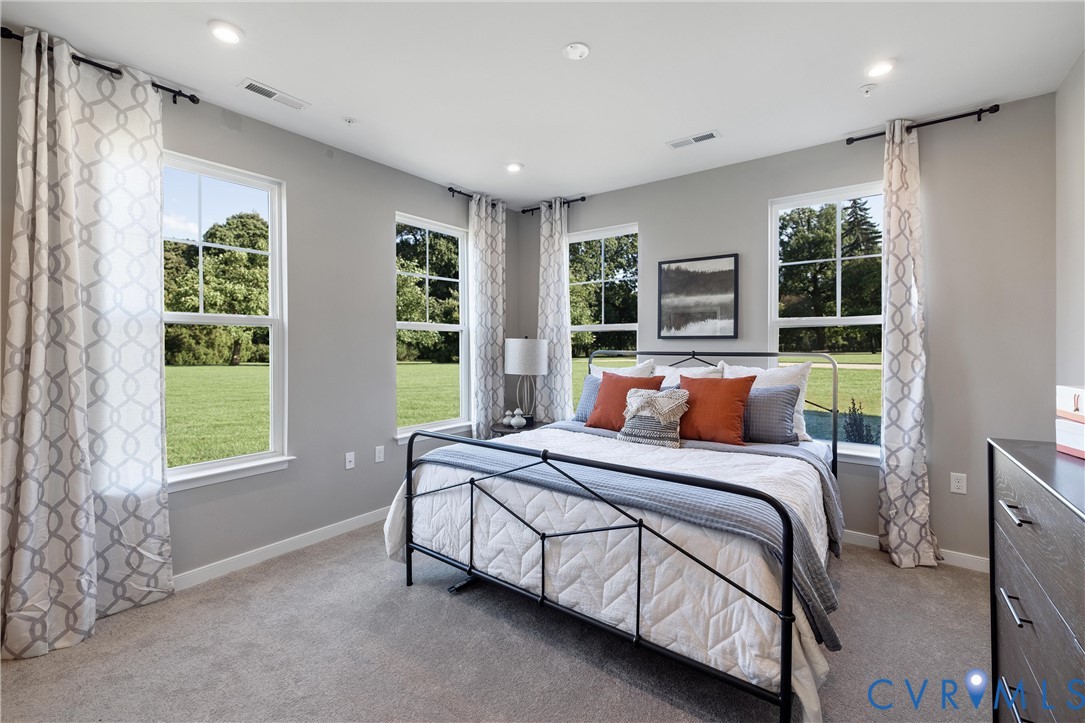 5340 Good Lndg Road, Unit 103 Glen Allen, VA 23059 - Photo 12 of 29 a bedroom with a bed and a window