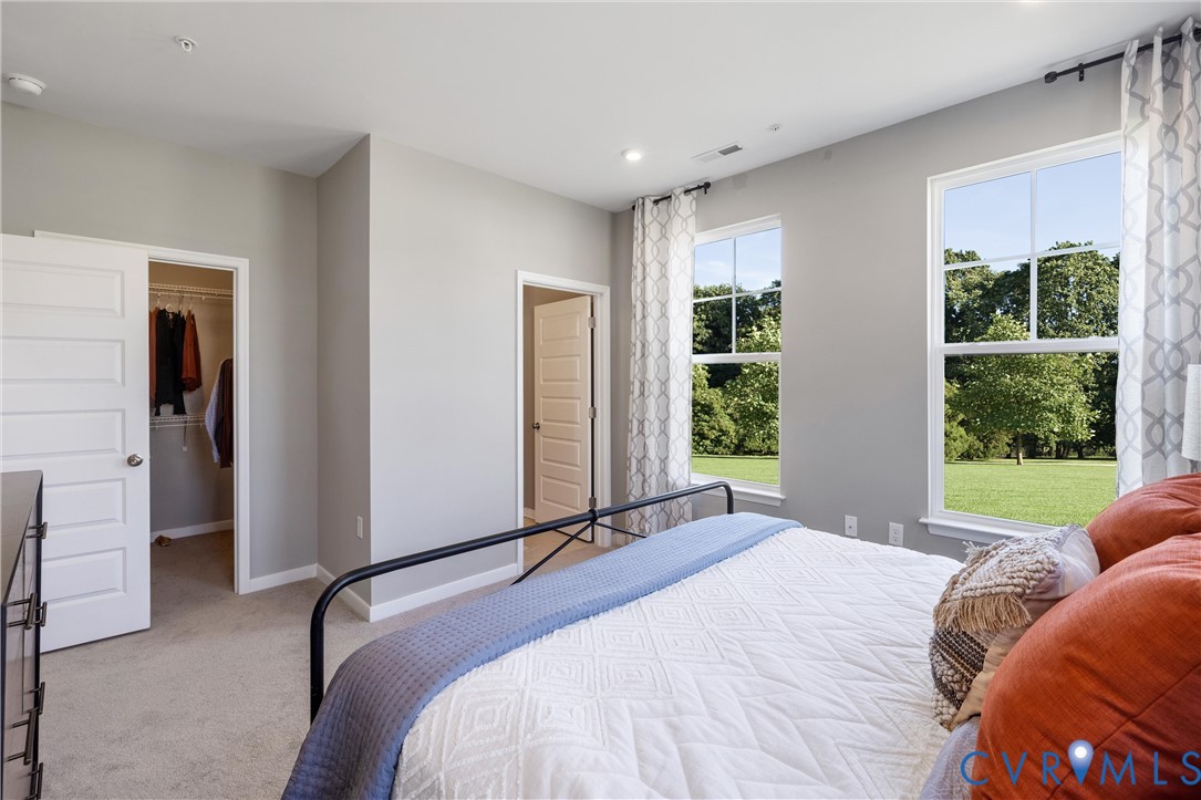 5340 Good Lndg Road, Unit 103 Glen Allen, VA 23059 - Photo 13 of 29 a bedroom with a bed and a window