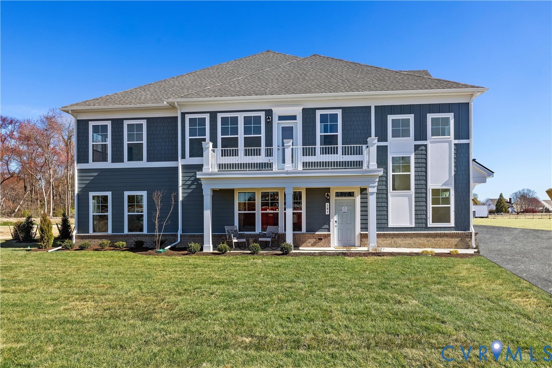 5340 Good Lndg Road, Unit 103 Glen Allen, VA 23059 - Photo 2 of 29 front view of a brick house with a yard