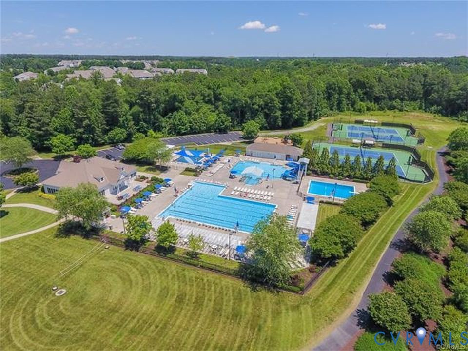 5340 Good Lndg Road, Unit 103 Glen Allen, VA 23059 - Photo 21 of 29 an aerial view of a house with a garden and swimming pool
