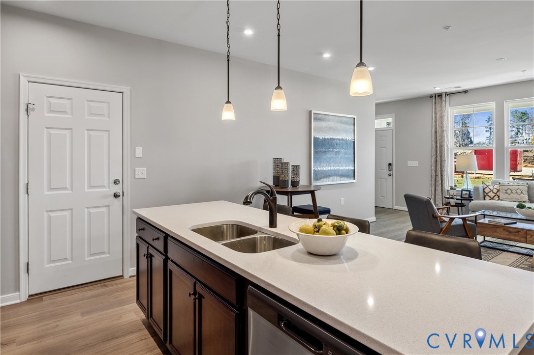 5340 Good Lndg Road, Unit 103 Glen Allen, VA 23059 - Photo 10 of 29 a kitchen with a sink a counter space and wooden floor
