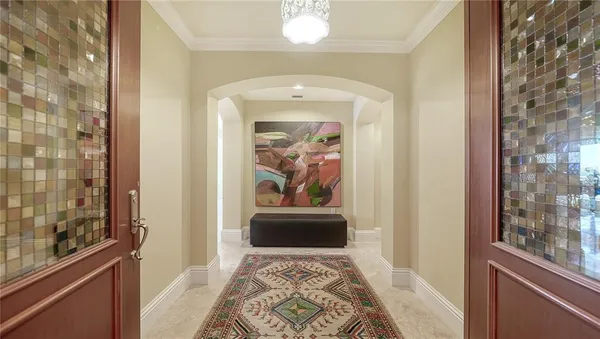 a view of a hallway with a window