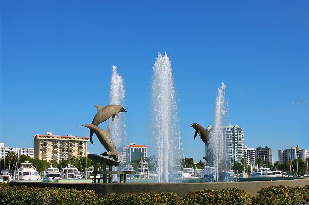 464 Golden Gate Point, Unit 304 Sarasota, FL 34236 - Photo 50 of 60 a front view of a building with garden