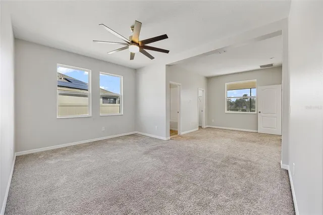 an aerial view of a house with a swimming pool