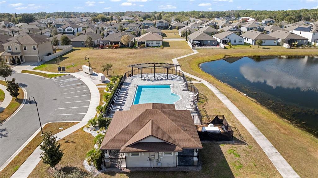 5356 Ragusa Loop St. Cloud, FL 34771 - Photo 64 of 69 an aerial view of a house with a ocean view