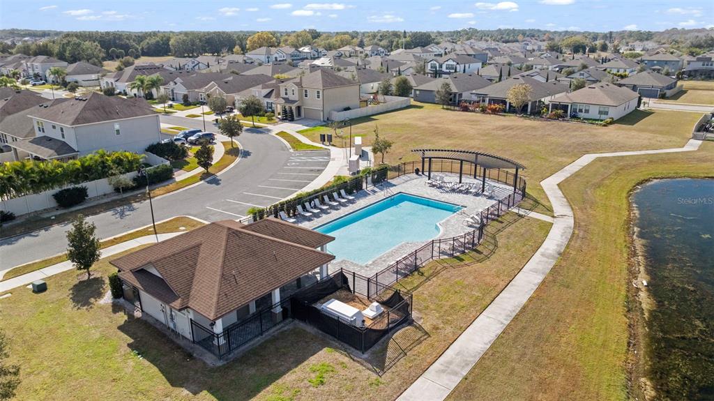 5356 Ragusa Loop St. Cloud, FL 34771 - Photo 65 of 69 an aerial view of a house with a swimming pool