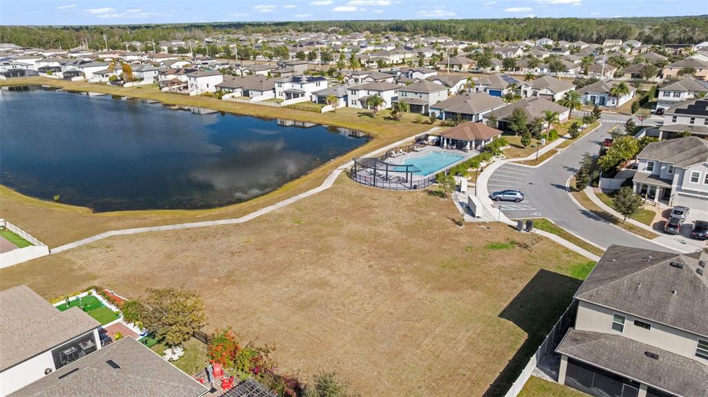 5356 Ragusa Loop St. Cloud, FL 34771 - Photo 68 of 69 an aerial view of residential houses with outdoor space