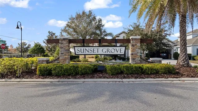 a sign that is on a street next to a road