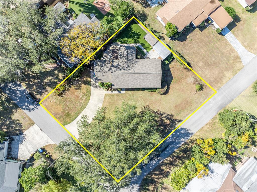 4234 Kendrick Road Orlando, FL 32804 - Photo 41 of 46 a view of swimming pool with a yard and sitting area