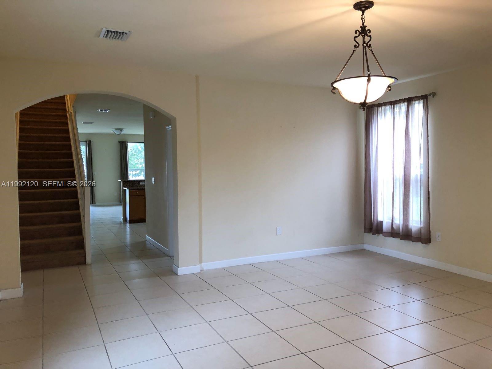 17000 Southwest 90th Terrace Miami, FL 33196 - Photo 29 of 56 a view of a room with entryway and window