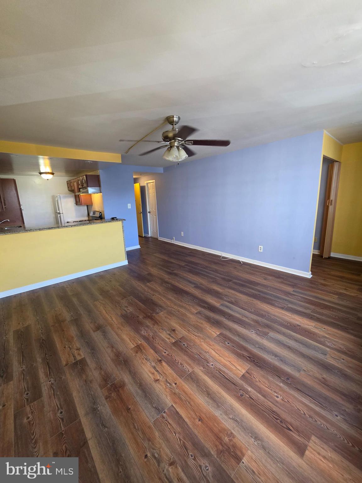 4600 Duke Street, Unit 507 Alexandria, VA 22304 - Photo 10 of 16 a view of a room with wooden floor