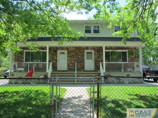 770 Magnolia Road North Brunswick, NJ 08902 - Photo 1 of 25 a view of house with a yard and sitting area