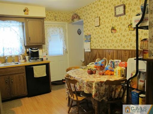 770 Magnolia Road North Brunswick, NJ 08902 - Photo 17 of 25 a table that has a lot of chairs in it
