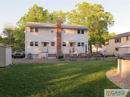 770 Magnolia Road North Brunswick, NJ 08902 - Photo 23 of 25 a front view of house with yard and trees