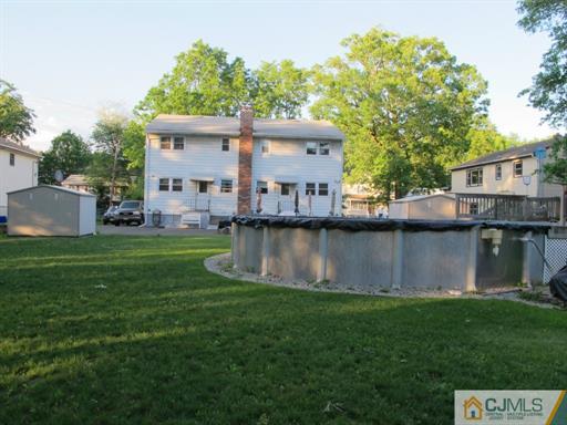 770 Magnolia Road North Brunswick, NJ 08902 - Photo 24 of 25 a view of a house with a yard and a patio