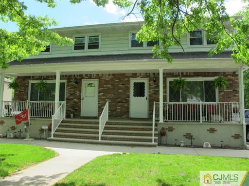 770 Magnolia Road North Brunswick, NJ 08902 - Photo 25 of 25 a front view of a house with a garden