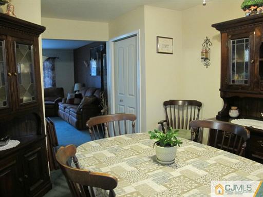 770 Magnolia Road North Brunswick, NJ 08902 - Photo 5 of 25 a view of a dining room with furniture