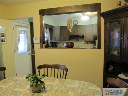 770 Magnolia Road North Brunswick, NJ 08902 - Photo 6 of 25 a bathroom with a tub mirror and sink