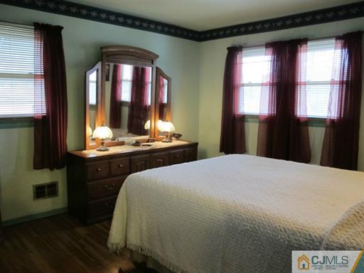 770 Magnolia Road North Brunswick, NJ 08902 - Photo 10 of 25 a bedroom with a bed and window