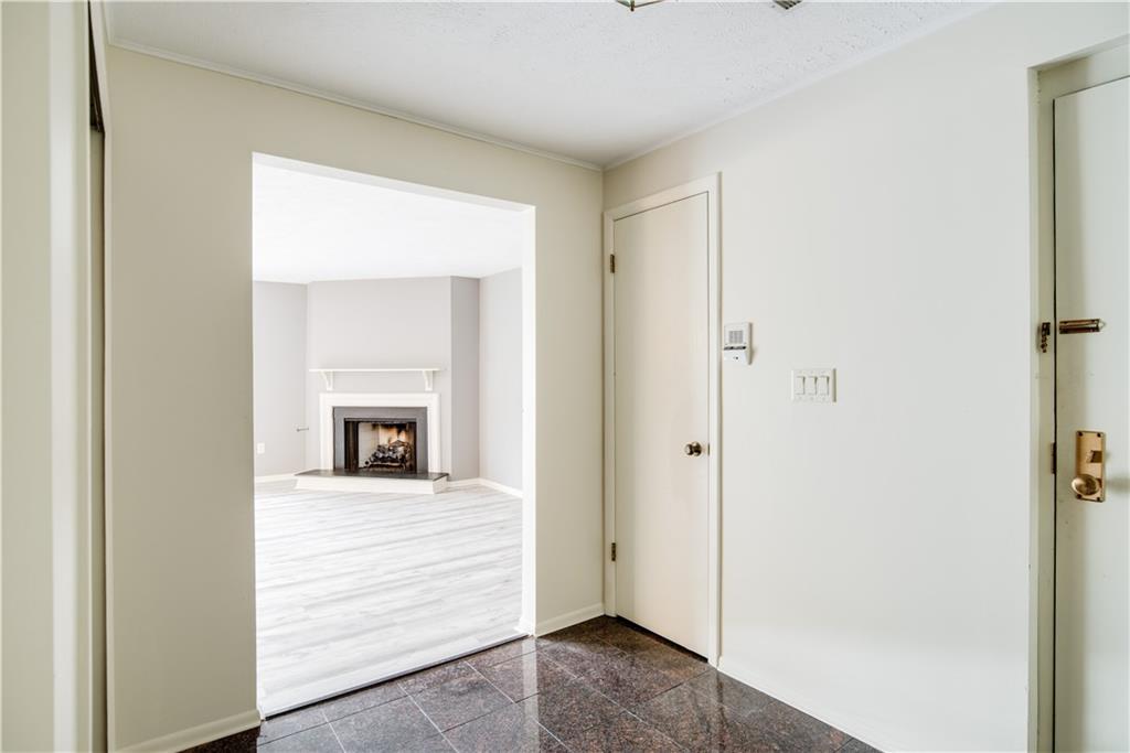 41 Huston Road, Unit 41 Oakmont, PA 15139 - Photo 11 of 15 a view of an empty room with wooden floor and a window