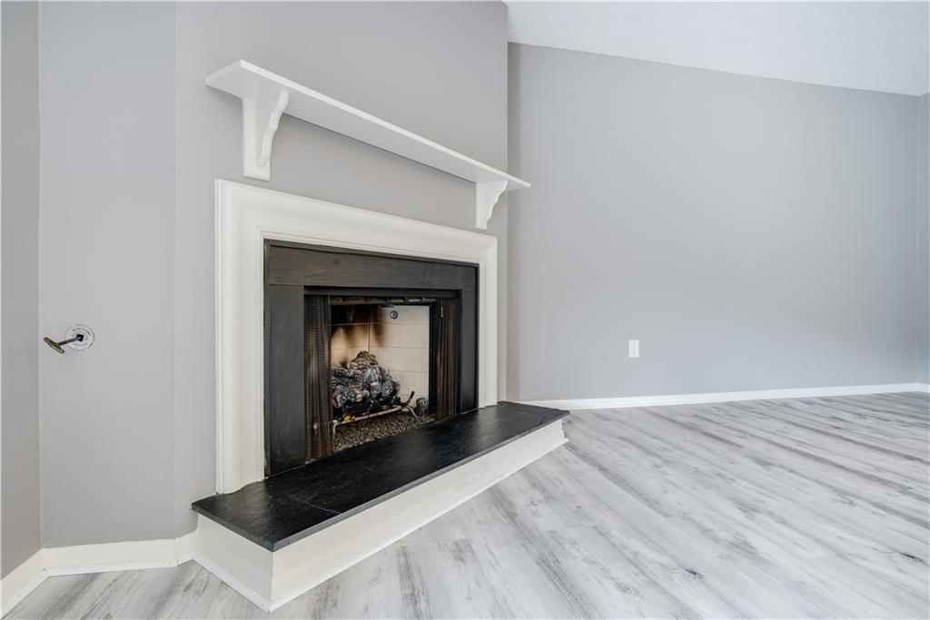 41 Huston Road, Unit 41 Oakmont, PA 15139 - Photo 6 of 15 a living room with a fireplace