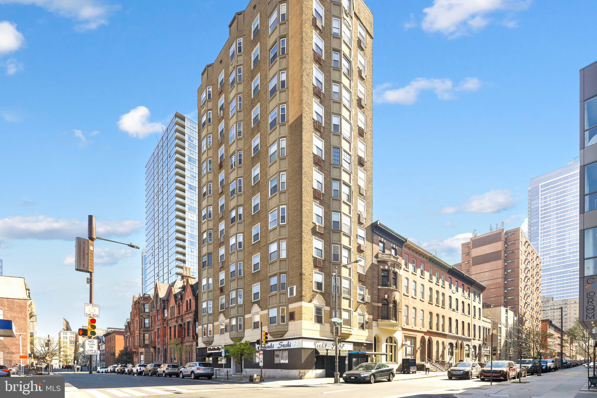 a city street lined with tall buildings