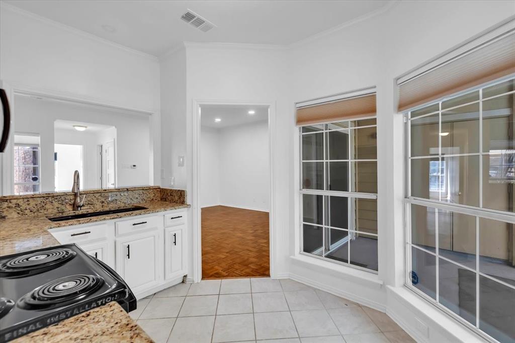 14277 Preston Road, Unit C315 Dallas, TX 75254 - Photo 9 of 26 Kitchen with granite ccountops