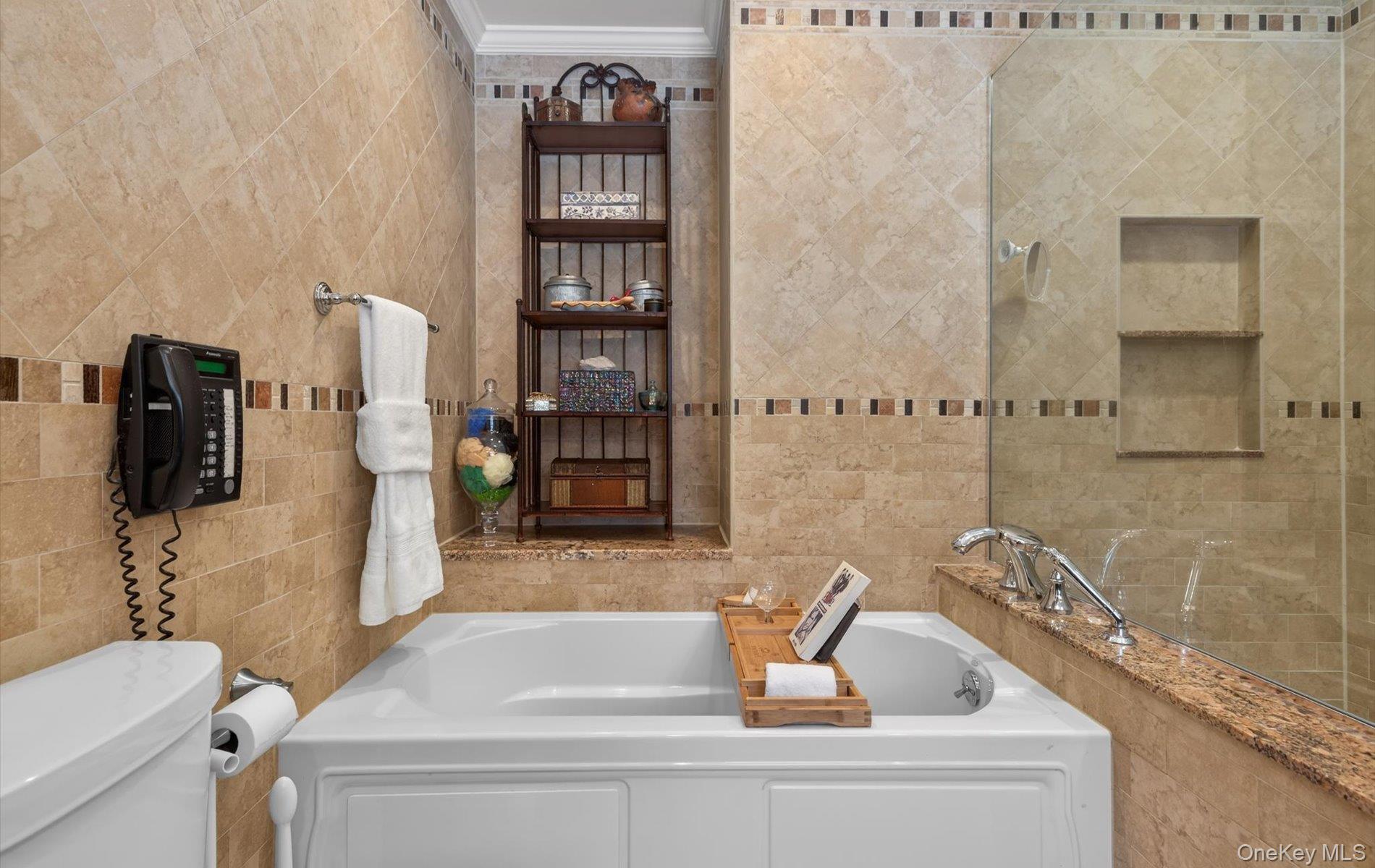 15 Tiber Road Syosset, NY 11791 - Photo 24 of 46 a bathroom with a sink and a mirror