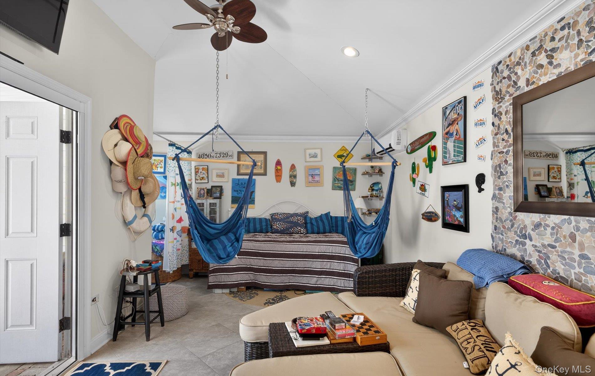 15 Tiber Road Syosset, NY 11791 - Photo 33 of 46 a bedroom with furniture and a chandelier