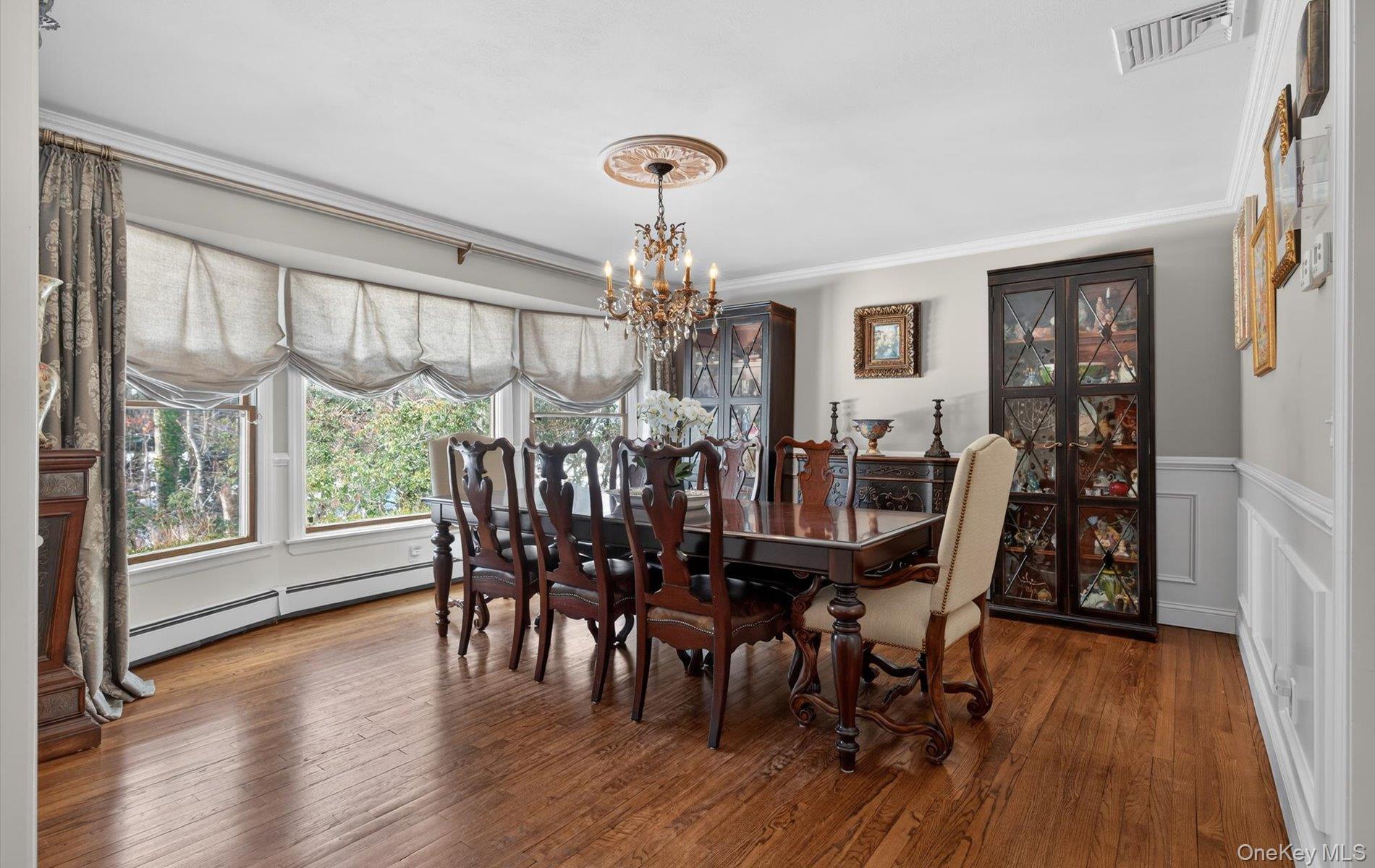 15 Tiber Road Syosset, NY 11791 - Photo 5 of 46 a view of a dining room with furniture window and wooden floor