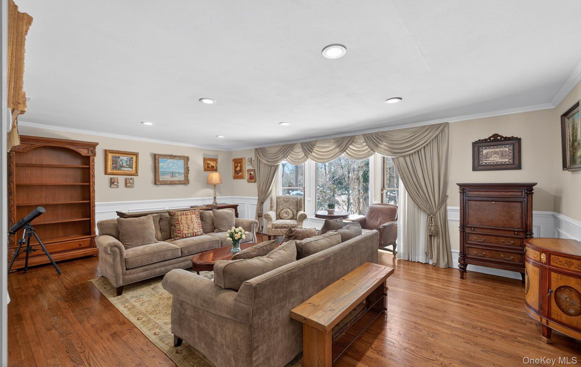 15 Tiber Road Syosset, NY 11791 - Photo 6 of 46 a living room with furniture and wooden floor