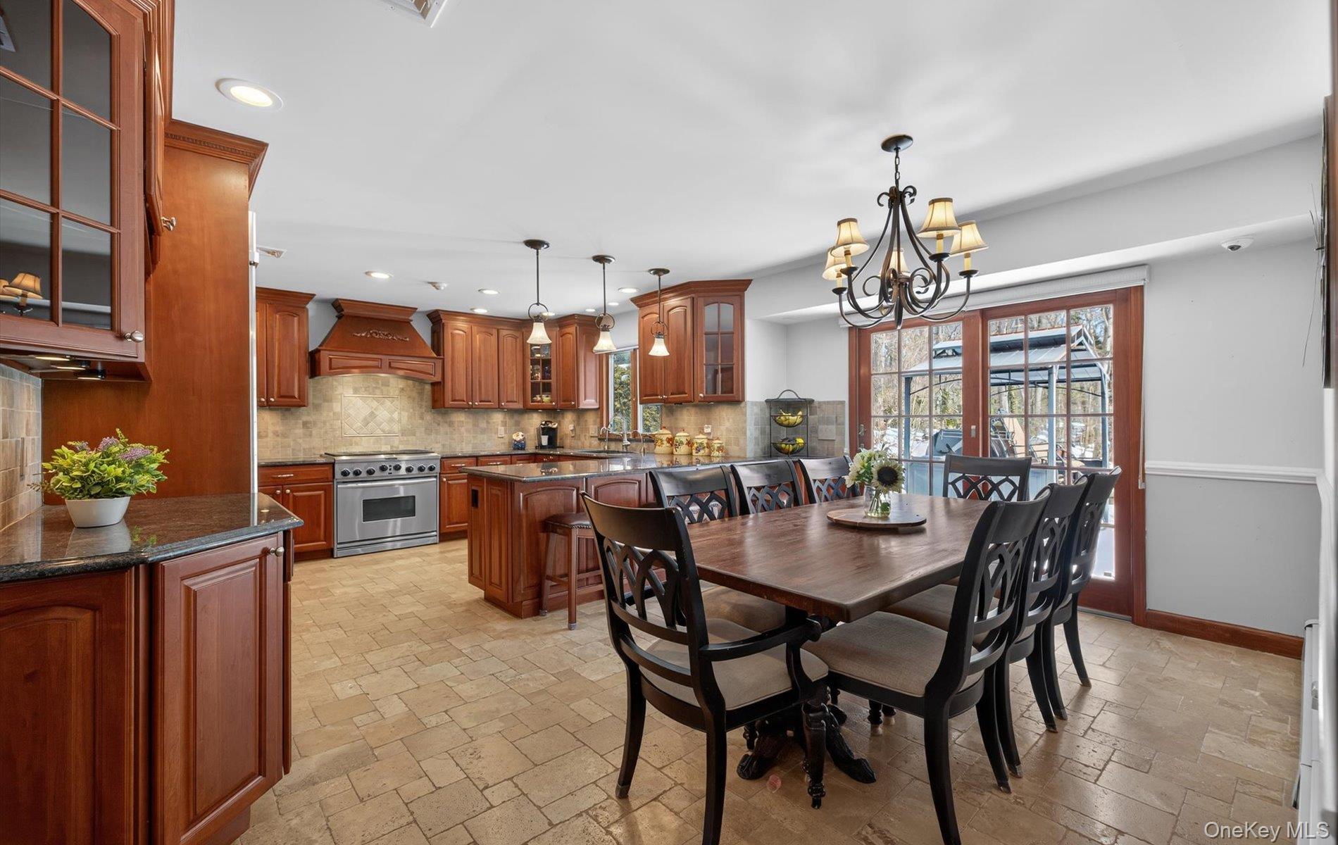 15 Tiber Road Syosset, NY 11791 - Photo 8 of 46 a view of a dining room with furniture and chandelier