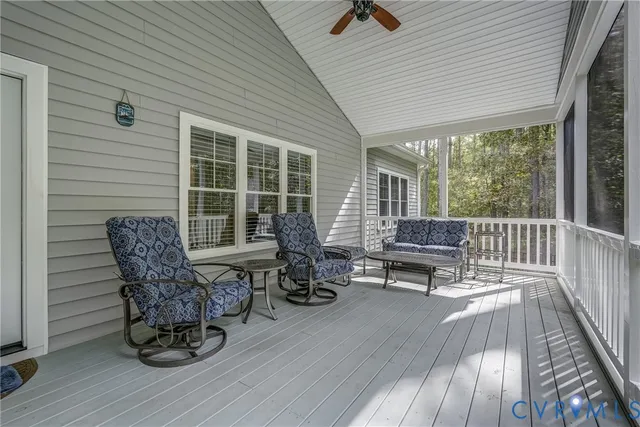 a view of two chairs in the balcony