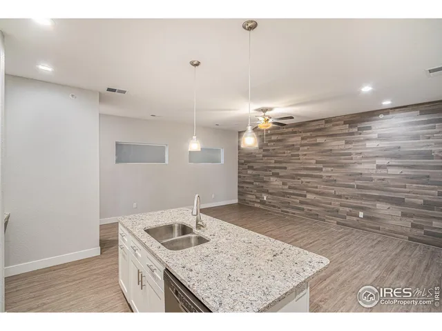 a bathroom with a sink a vanity and a mirror