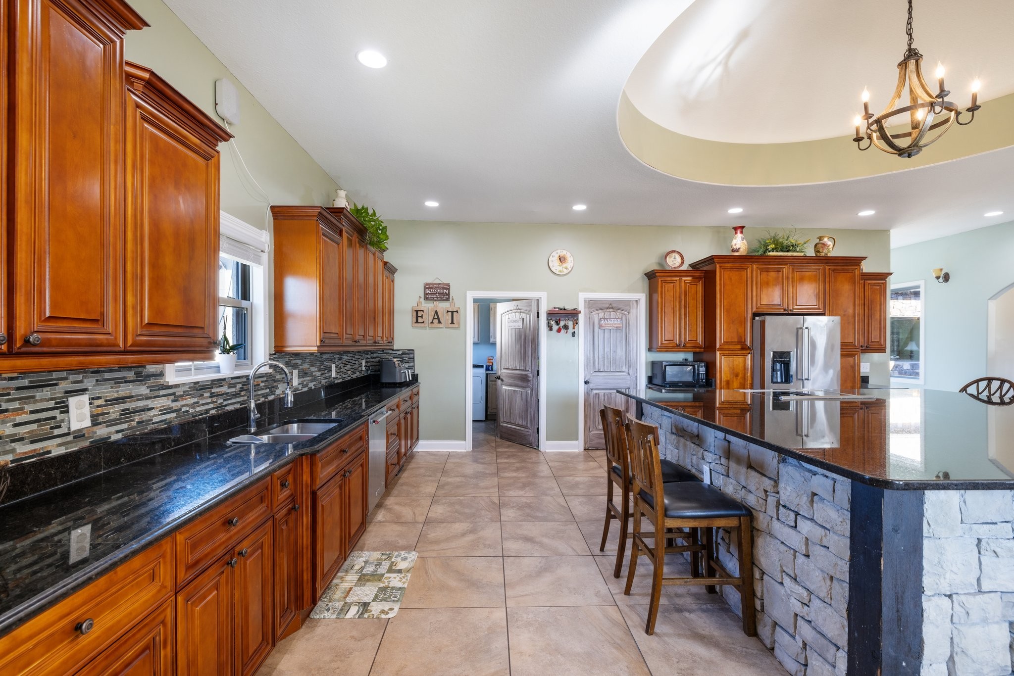 4785 Pulliam-Hardaway Road Springfield, TN 37172 - Photo 24 of 67 a kitchen with stainless steel appliances a sink and cabinets