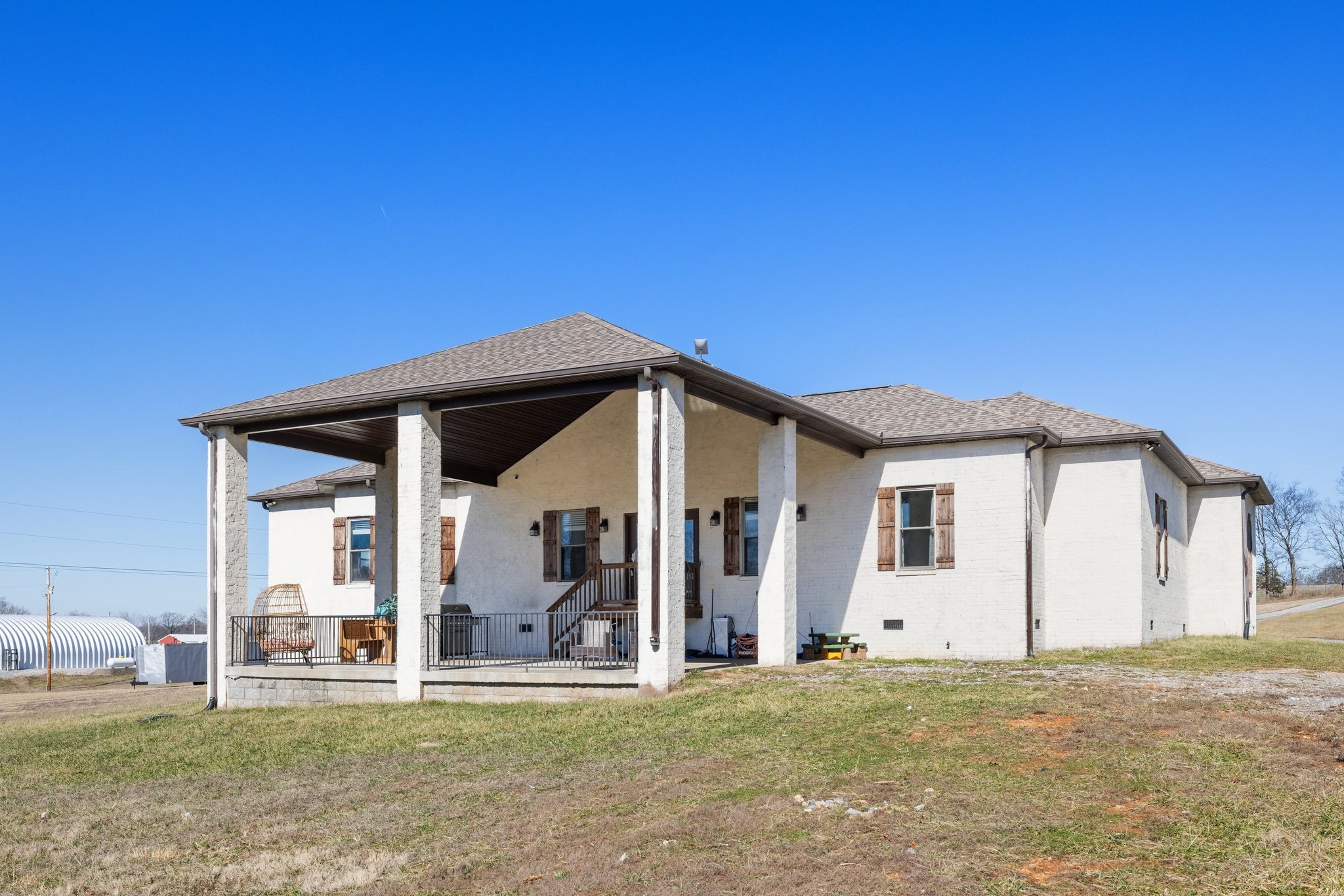 4785 Pulliam-Hardaway Road Springfield, TN 37172 - Photo 44 of 67 a view of a house with a backyard and a patio