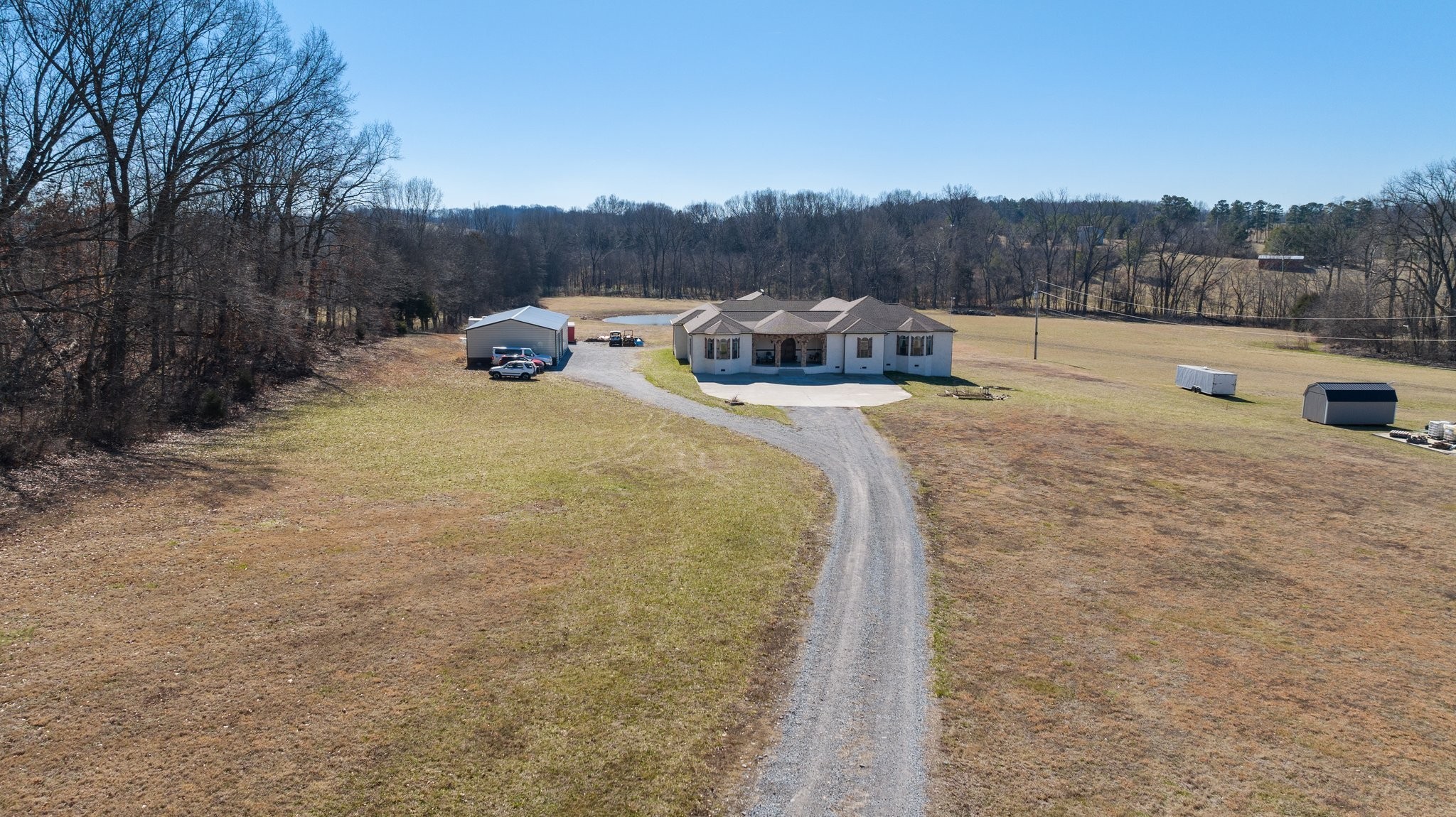 4785 Pulliam-Hardaway Road Springfield, TN 37172 - Photo 50 of 67 a backyard of a house with table and chairs