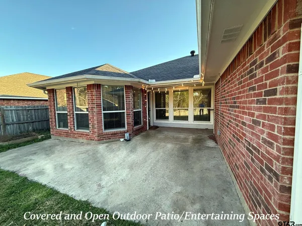 a view of a house with a garden