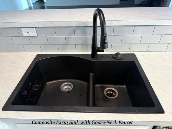 a black and white photo of a sink