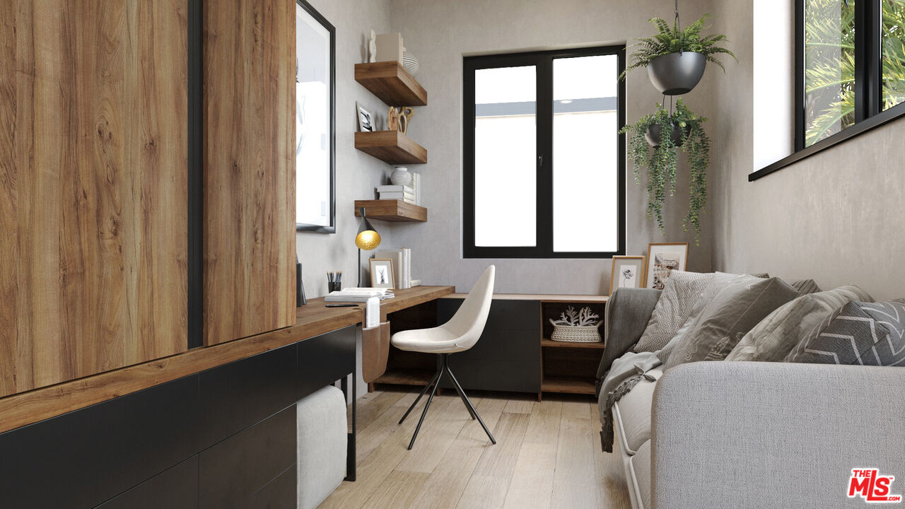 827 Dickson Street Marina del Rey, CA 90292 - Photo 13 of 18 a living room with furniture and a window