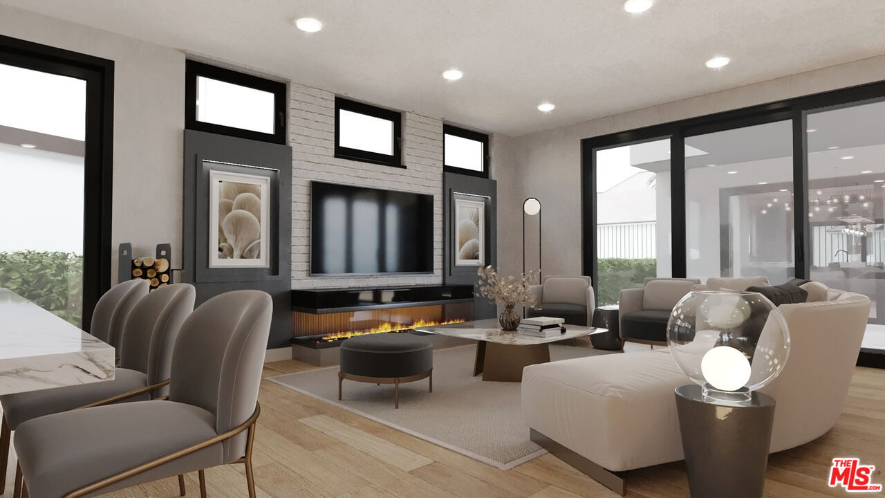 827 Dickson Street Marina del Rey, CA 90292 - Photo 4 of 18 a living room with furniture and a large window