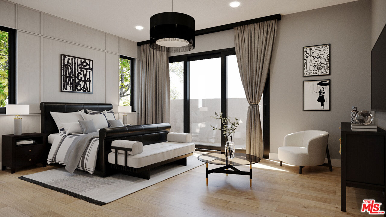 827 Dickson Street Marina del Rey, CA 90292 - Photo 6 of 18 a spacious bedroom with a bed couch and a large window