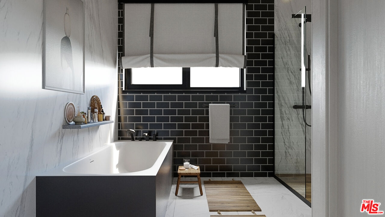 827 Dickson Street Marina del Rey, CA 90292 - Photo 9 of 18 a bathroom with a sink and a shower