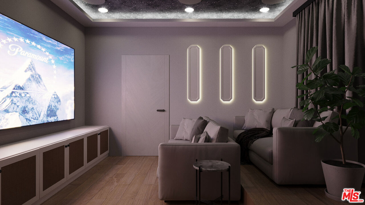 827 Dickson Street Marina del Rey, CA 90292 - Photo 10 of 18 a living room with furniture a flat screen tv and a floor to ceiling window