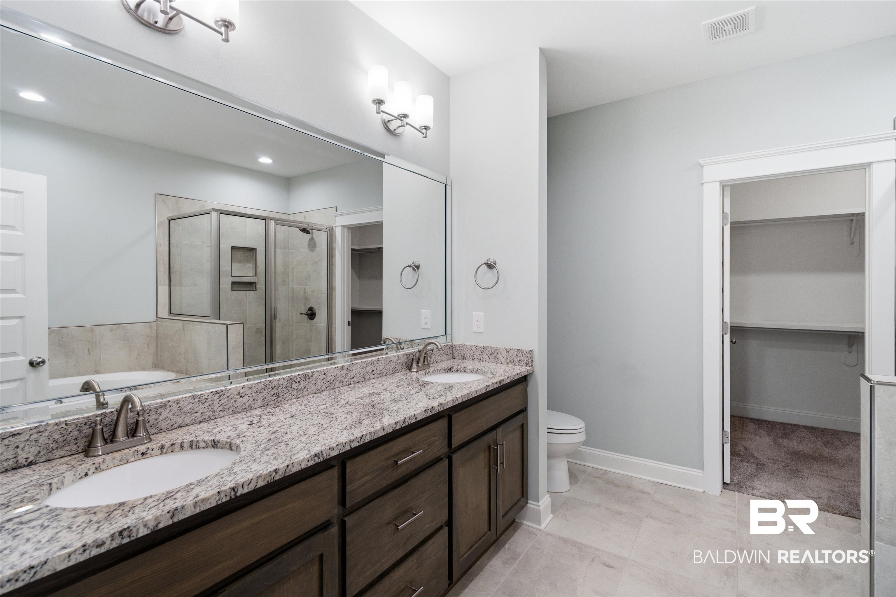 245 Divot Loop Fairhope, AL 36532 - Photo 15 of 26 Double vanity with granite countertop and undermount sinks