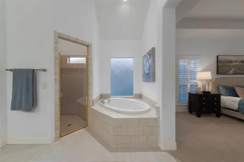a bathroom with a bathtub sink and toilet