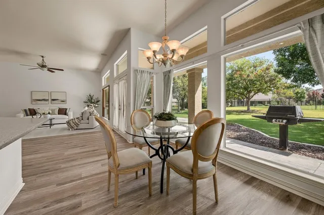a view of a house with a yard porch and sitting area