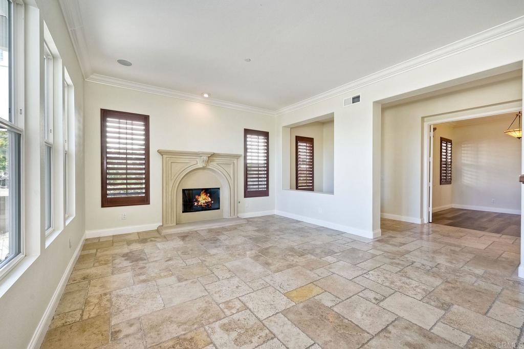 2606 Canto Rompeolas San Clemente, CA 92673 - Photo 3 of 18 an empty room with windows and fireplace