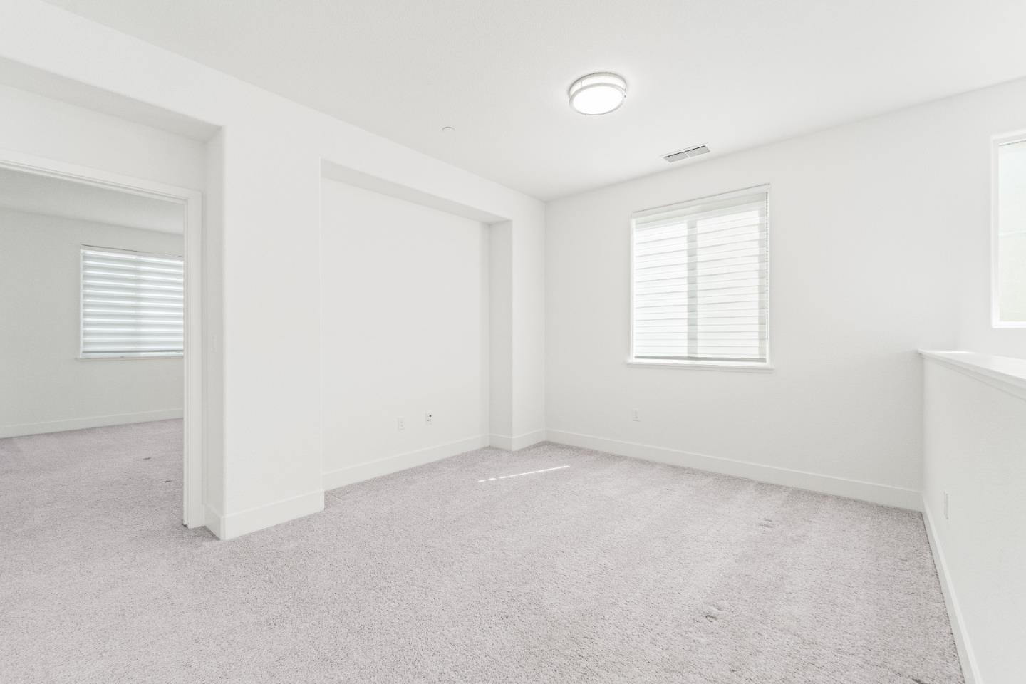 384 Ramos Ranch Road Oakley, CA 94561 - Photo 18 of 39 an empty room with windows