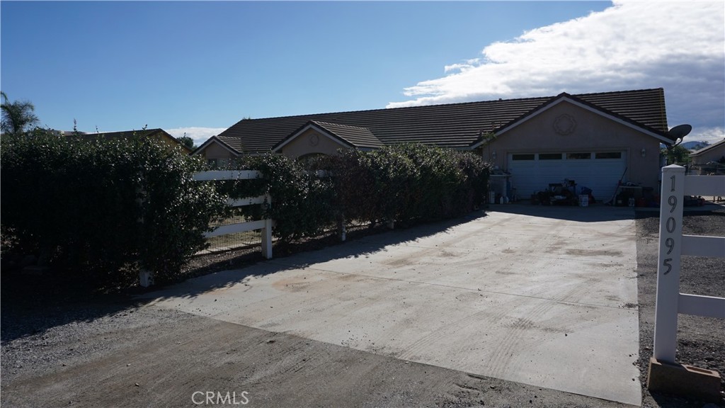 19095 Glenwood Avenue Riverside, CA 92508 - Photo 12 of 14 a view of a house with a snow in the background